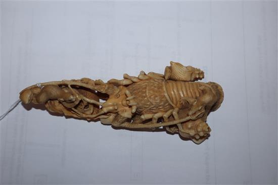 A Japanese ivory okimono of rats crawling over a lobster, early 20th century, unsigned 14.5cm